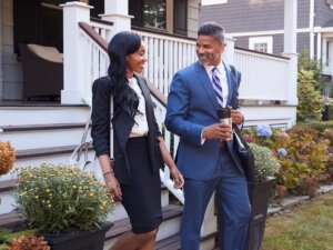 Smiling couple discovers the process to sell their rental property